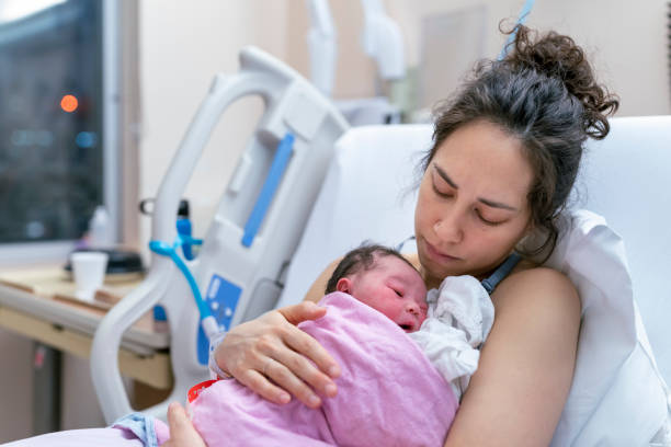 Why do babies cry soon after they are delivered?